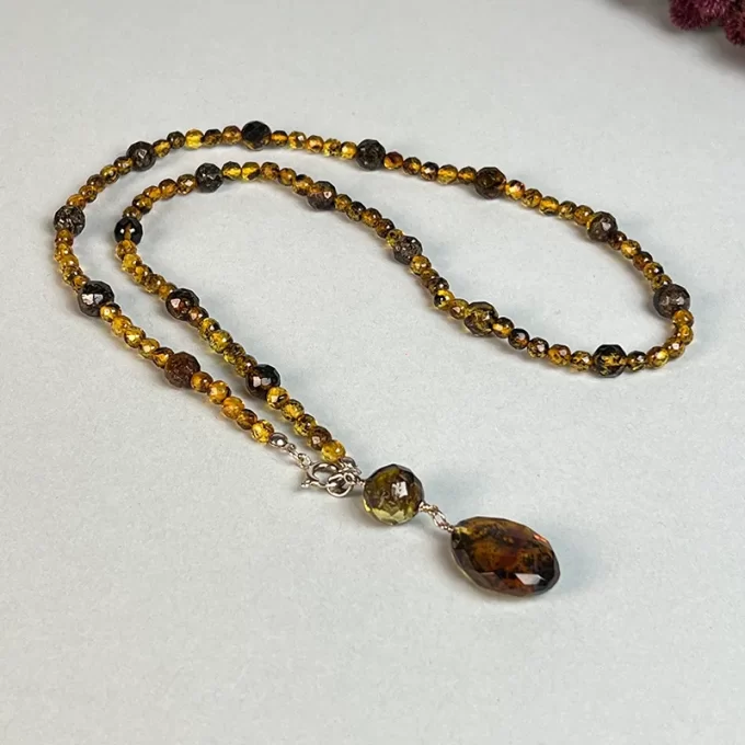 Stylish faceted yellow amber necklace, pendant and earrings set