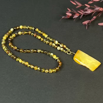 Stunning speckled amber bead necklace with landscape amber pendant