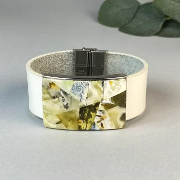 Stylish white leather bracelet with mosaic landscape amber detail
