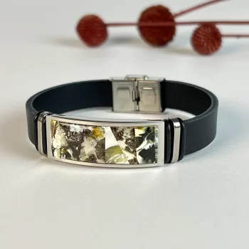 Stylish black men's leather bracelet with blue landscape amber detail