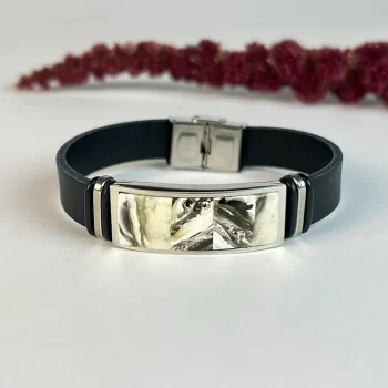 Stylish black men's leather bracelet with landscape amber detail