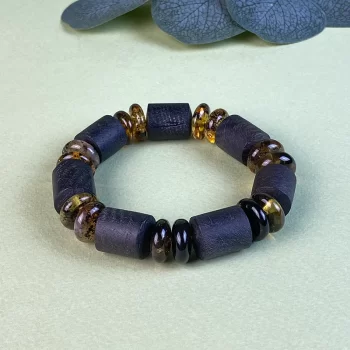 Men's stylish black oak and moss amber disc bracelet