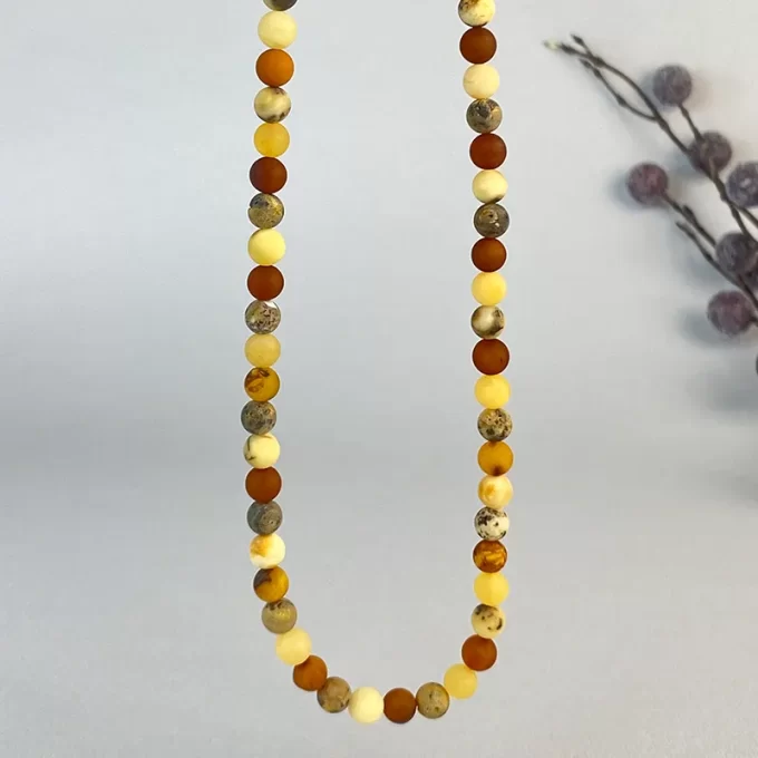 Stylish men's necklace in multicoloured matt amber beads