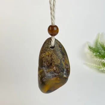 Stylish solid matt dark amber men's neck pendant on linen cord