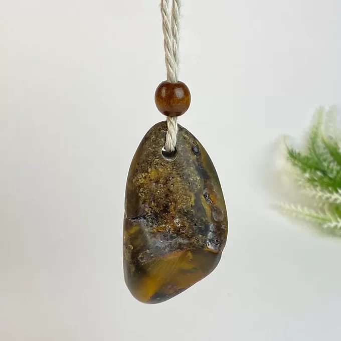 Stylish solid matt dark amber men's neck pendant on linen cord