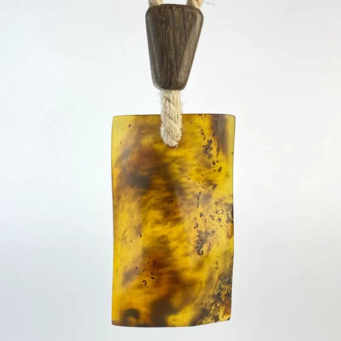 Stylish matt yellow amber men's neck pendant on linen cord
