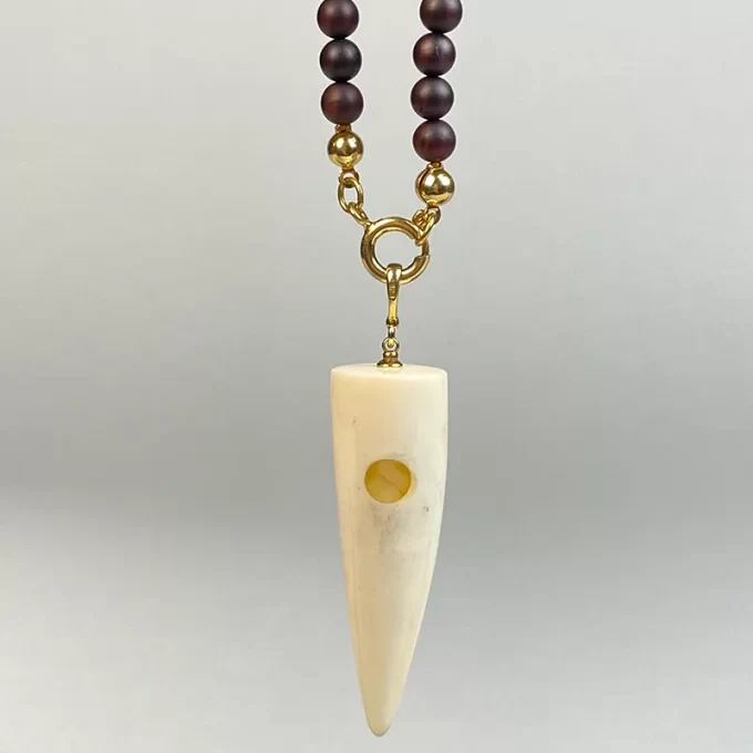 Stylish matt dark cherry amber amber bead necklace with elk antler pendant