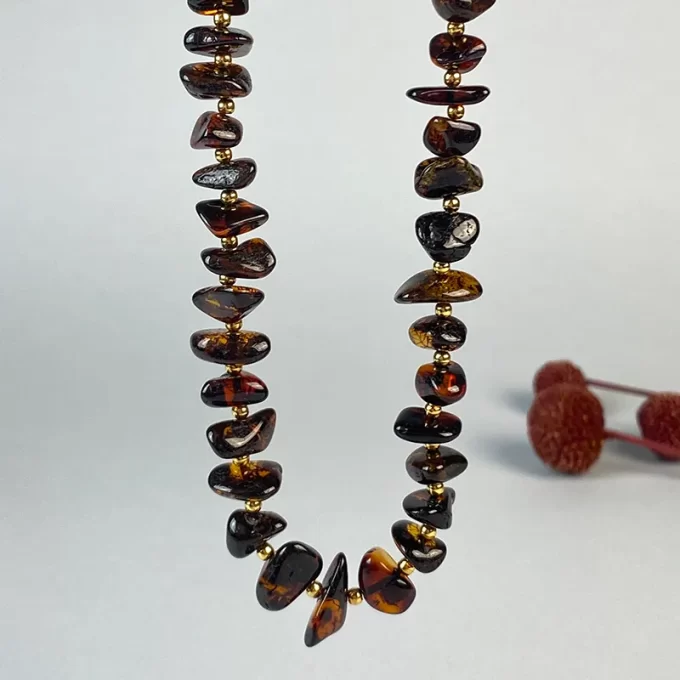 Stylish dark honey coloured amber pebble necklace