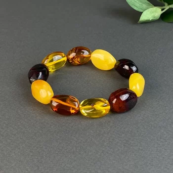 Pretty bracelet made of amber pebbles in various colours