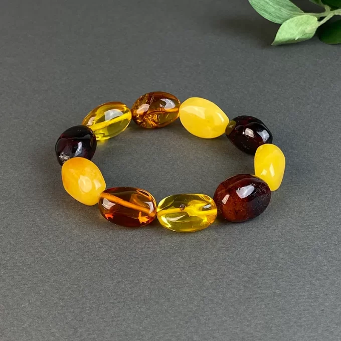 Pretty bracelet made of amber pebbles in various colours