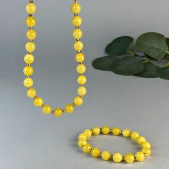 Fine set of necklace and bracelet in shiny yellow amber