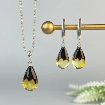 Fine set of faceted clear amber earrings and pendant