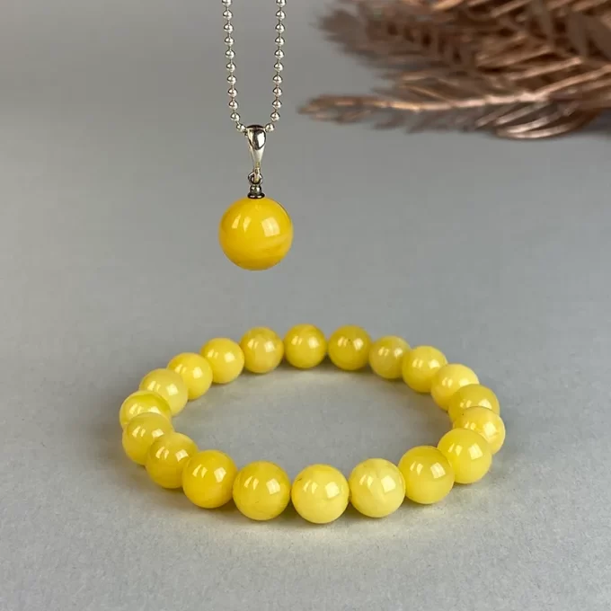 Fine yellow amber bead bracelet and pendant set