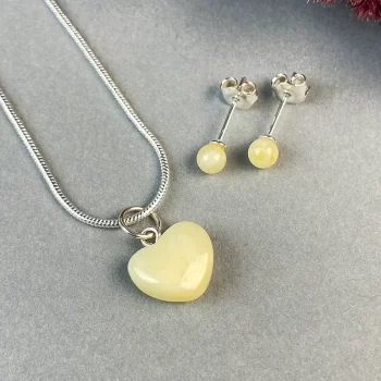 Fine set of light landscape amber earrings and heart-shaped pendant