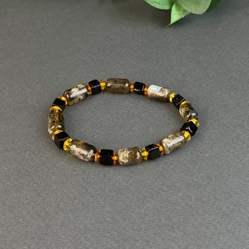 Stylish amber bracelet with amber details in various shapes and colours