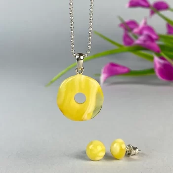 Stylish set of yellow landscape amber stud earrings and amulet pendant