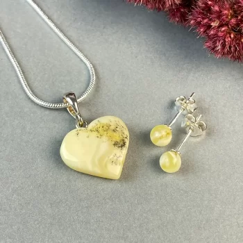 Stylish set of landscape amber stud earrings and heart-shaped necklace pendant