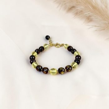 Prabangi ir stilinga žalsvo ir skaidraus facetuoto gintaro ayrankė